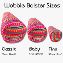 Three colorful Wobble bolsters of different sizes on a white background with text indicating sizes and dimensions.