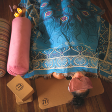 Pink velvet round yoga bolster by Wobble Yoga. Recycled plastic sustainable. Designed in Australia.