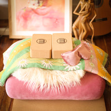 Pink velvet round yoga bolster by Wobble Yoga. Recycled plastic sustainable. Designed in Australia.