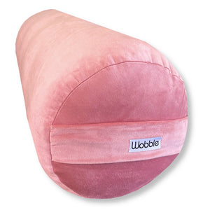 Pink velvet round yoga bolster by Wobble Yoga. Recycled plastic sustainable. Designed in Australia.